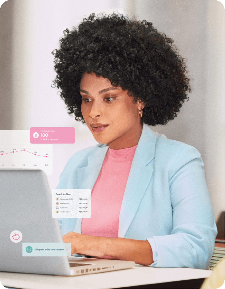 Profissional focada trabalhando em seu laptop em um escritório.
